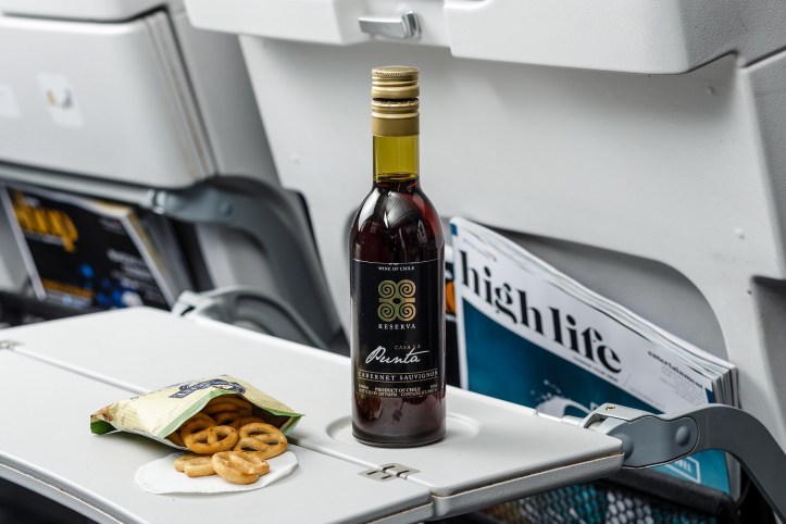 British Airways' new World Traveller catering - pretzels with red wine