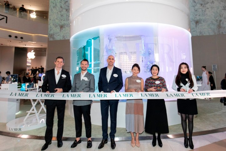 DFS, La Mer and Hysan Development brand representatives performing a ribbon cutting ceremony.jpg