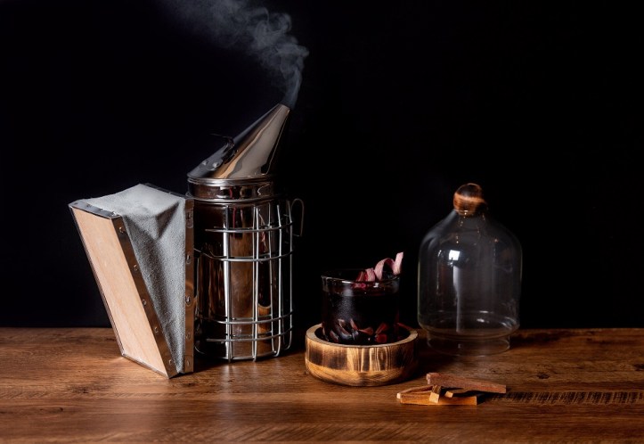 Rhubino with bee smoker