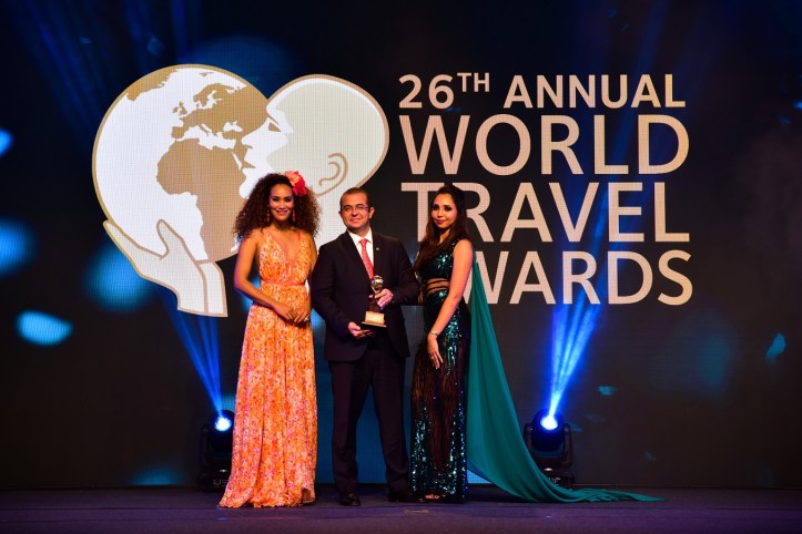 Fraser Suites Abuja General Manager Deniz Isikei (left) receives the award for Nigeria’s Leading Serviced Apartments at the 2019 World Travel Awards in Africa.jpg