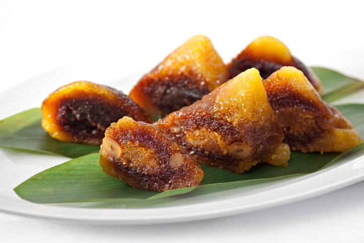 Xin Cuisine - Red Lotus Seed Paste and Chestnut Dumpling served with Osmanthus Sauce