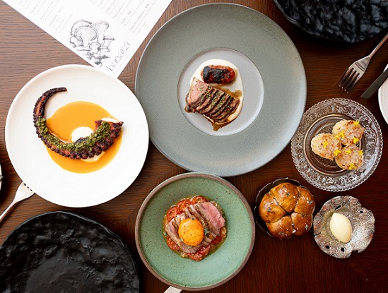 From top, clockwise_ Presa, Tiradito, Pan de la Casa, Cordero a Caballo, Pulpo